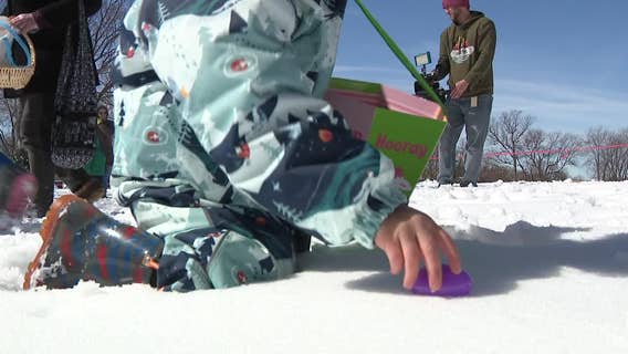 Humboldt Park Easter Egg Hunt, kids search through snow