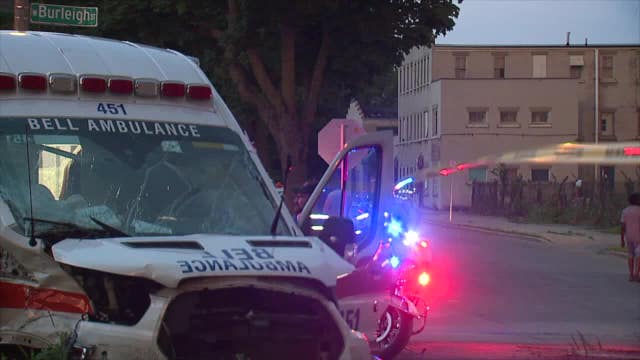 Milwaukee crash, police squad and Bell Ambulance: dashcam video