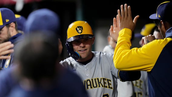 Brewers beat Reds following game delay due to weather