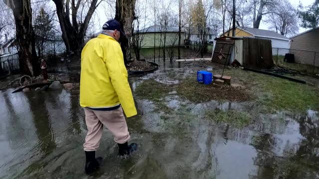 Milwaukee couple battles backyard flooding
