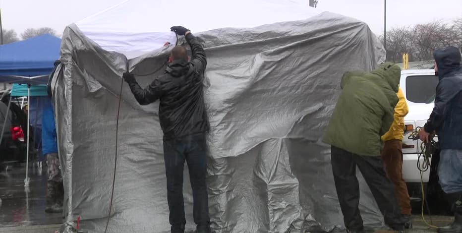Brewers home opener: Fans brave cold, wintry mix outside ballpark