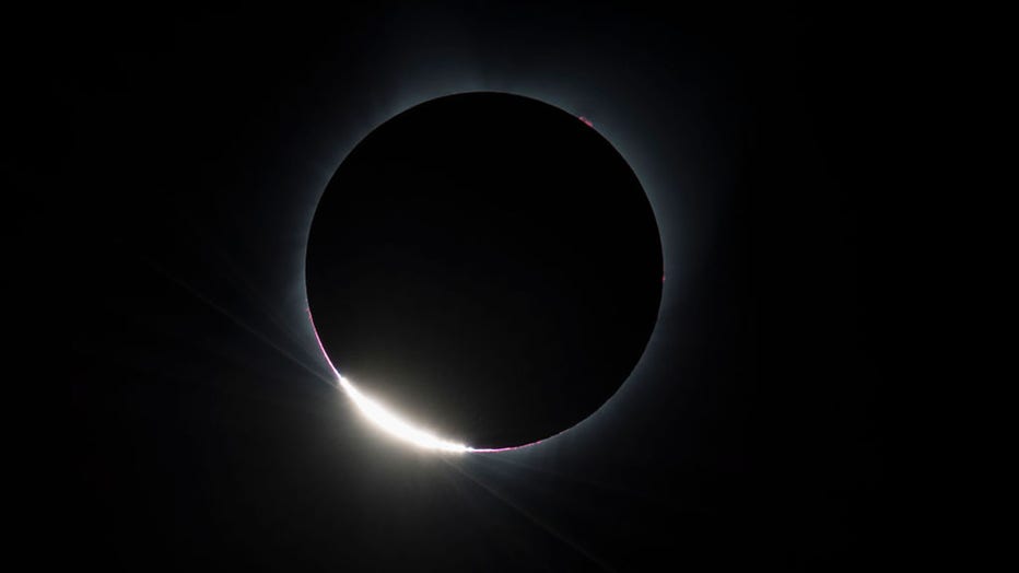 The Diamond Ring effect is seen as the moon makes its final move over the sun during the total solar eclipse on Monday, August 21, 2017 above Madras, Oregon. (Photo by: HUM Images/Universal Images Group via Getty Images)