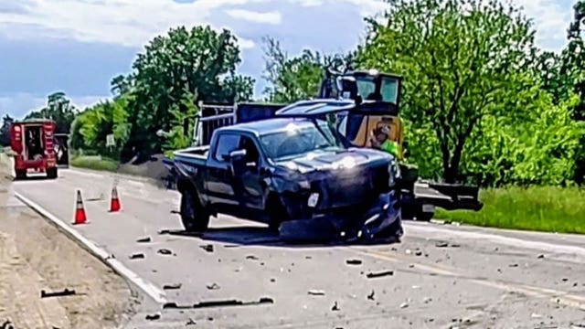Kansasville collision between dump truck, pickup; fuel leak contained