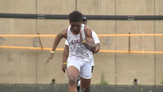 Rufus King athlete shines in track, football; supported by family