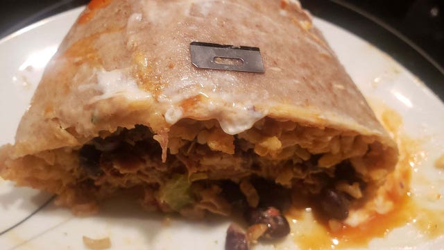 Razor blade in Qdoba burrito; restaurant's license suspended 10 days