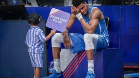 NBA star Giannis Antetokounmpo cries with sons in emotional scene after helping Greece reach Olympics