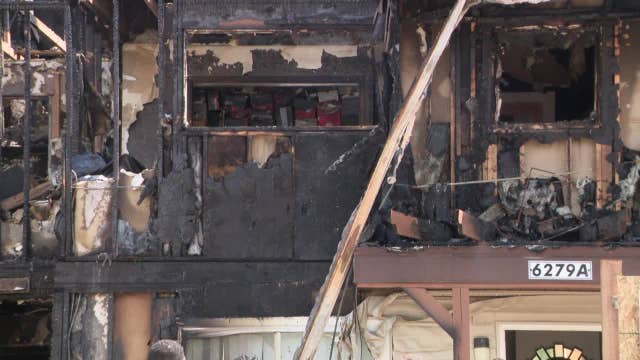 Milwaukee apartment fire; residents salvage what they can from homes