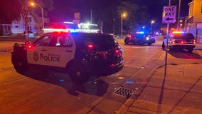 Milwaukee bar security guard shot; 22-year-old man charged, on the run