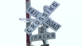 Train-tanker collision prompts questions about railroad crossings