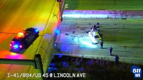 West Allis police chase; driver crashes into overpass fence, lands on freeway