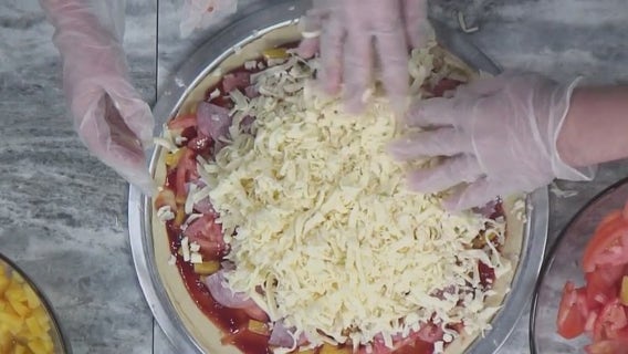 National Hawaiian Pizza Day; does the fruit belong on pizza?