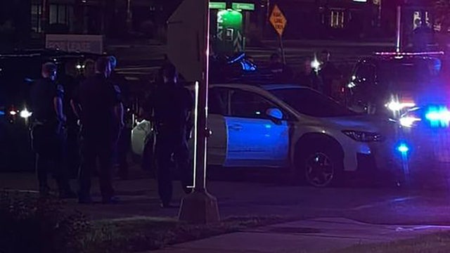 Racine police squad struck during pursuit, woman arrested