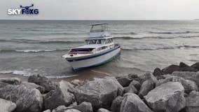 Lake Michigan mystery boat; Milwaukee beach sees boat wash ashore