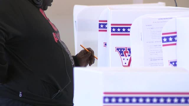 Wisconsin early voting; shorter lines, system lags ease