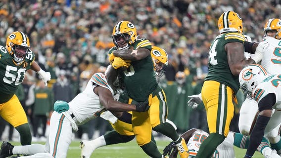 Packers beat Dolphins, Love connects with Reed on 2 TDs