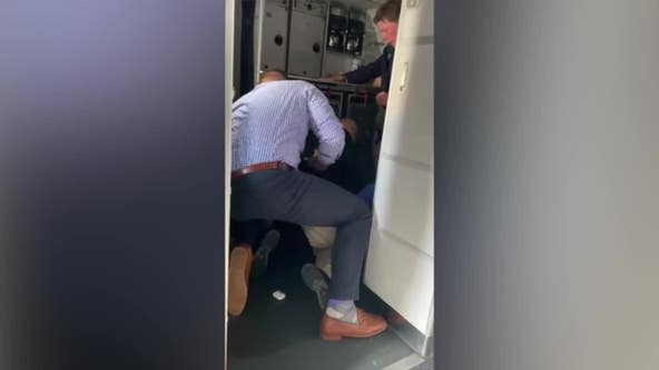 Exclusive video: Passengers subdue 'disruptive' man on Milwaukee flight to Dallas