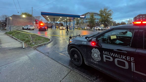 Milwaukee police presence; 51st & Lisbon, gas station taped off