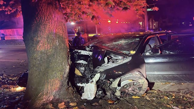 Vehicle down embankment at Forest Home and Layton in Greenfield