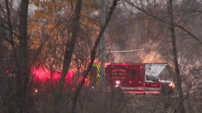 Jackson barn fire; 1 person burned, taken to hospital