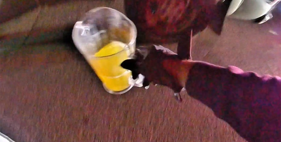 Wisconsin OWI arrest, beer pitcher found in vehicle