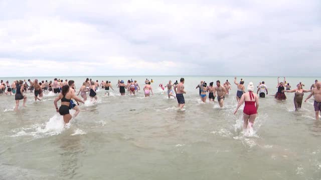 Milwaukee Polar Plunge; New Year's Day tradition at Bradford Beach