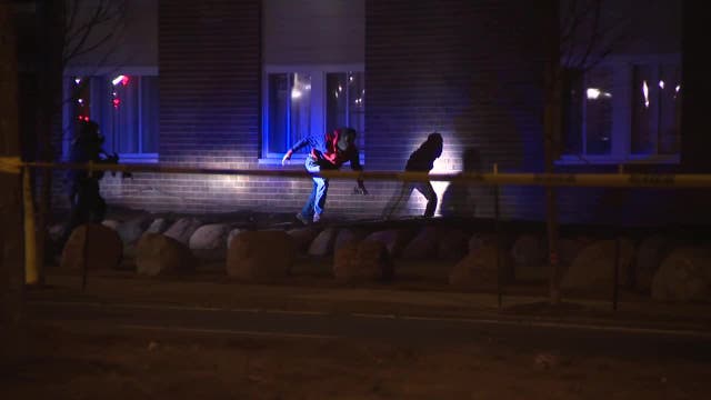 Milwaukee police standoff: homicide suspect jumps from window, arrested