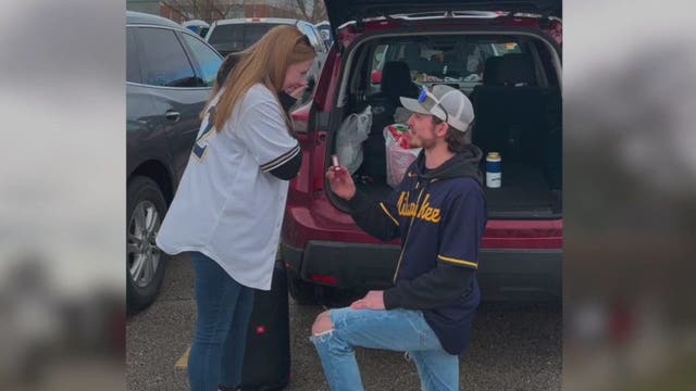 Milwaukee Brewers home opener, tailgating couple gets engaged