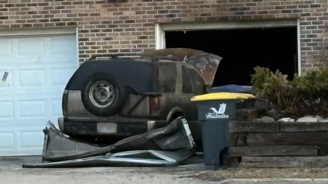 Waukesha garage fire contained, cause under investigation