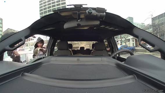 Car break-in captured by dash camera at Milwaukee parking lot