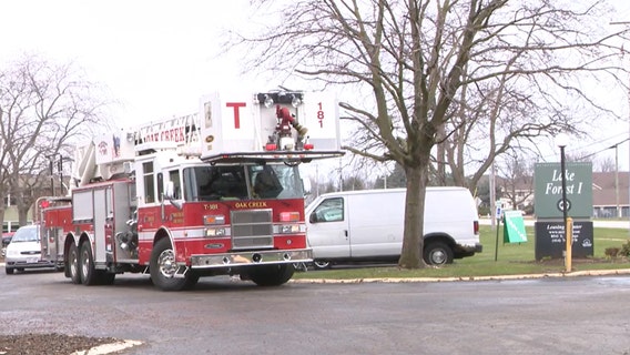 Oak Creek apartment fire, roofing contractors injured
