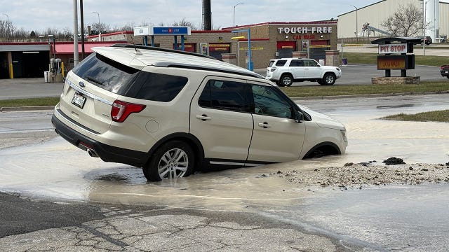 Milwaukee water main break; sinkhole forms at 107th and Brown Deer