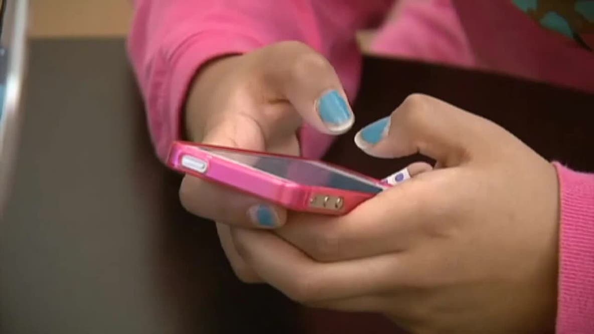 Wisconsin school cellphone use limits, Evers signs bipartisan bill
