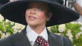 Rihanna shows off baby bump on Met Gala red carpet