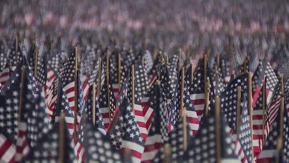 Milwaukee Memorial Day tribute; volunteers place flags at Veterans Park
