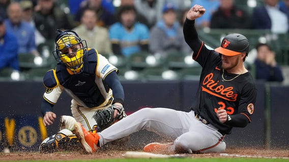 Brewers lose to Orioles, Baltimore scores 4 in 11th-inning rally