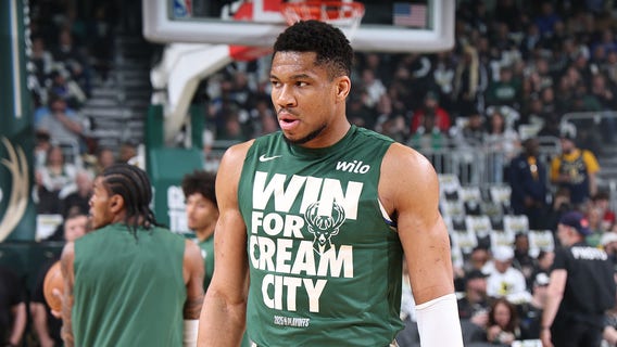 Bucks' Giannis Antetokounmpo shows off 4-word message on guns