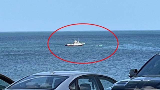 Bender Park water rescue; 2 people on paddle board brought back to safety