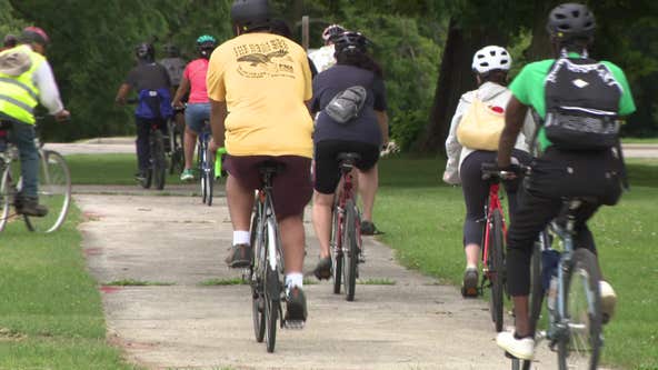 Milwaukee River Greenway bike ride; riders see river restoration efforts