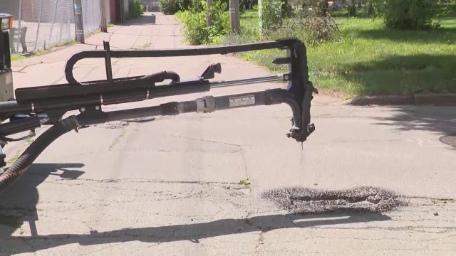 Milwaukee pothole repair demonstration; highlights city’s road patchers