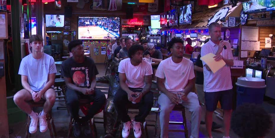 Marquette players receive a blue and gold welcome at Major Goolsby's