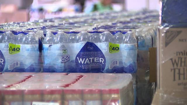 Water, peanut butter donation to Feeding America Eastern Wisconsin