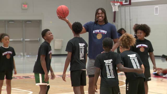 Kevon Looney, Running Rebels partner for Milwaukee unity events