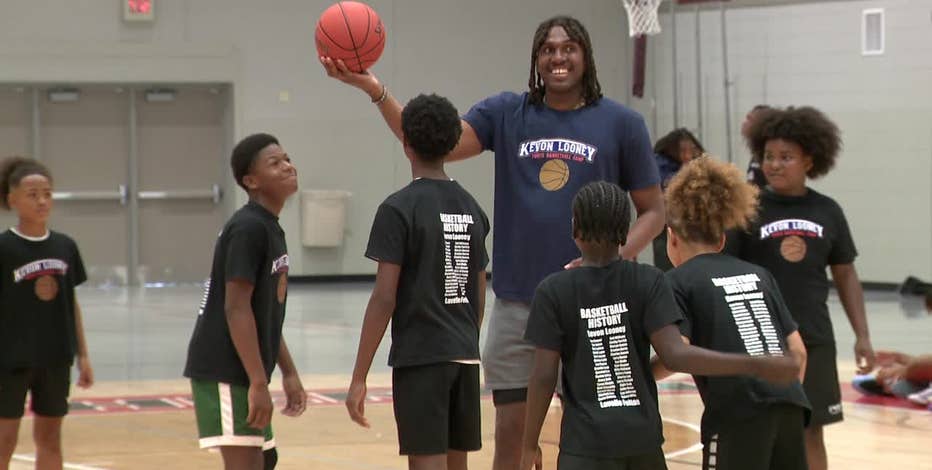 Kevon Looney, Running Rebels partner for Milwaukee unity events