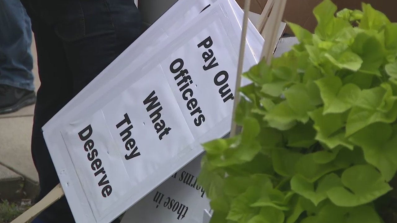 Protests over Milwaukee Police Department pay at City Hall