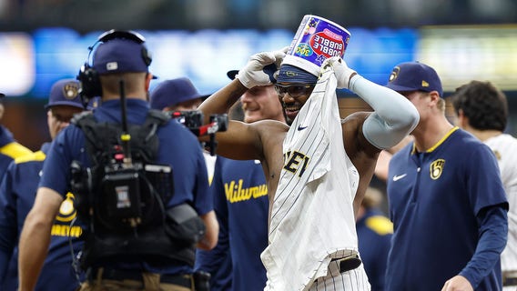 Brewers rally, walk off Cardinals in 10th after clinching playoffs