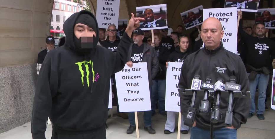 Milwaukee police pay: Union protests, activists counter-protest