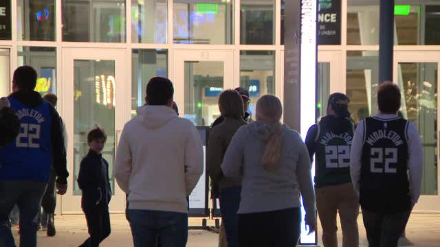 Bucks fans welcome back Khris Middleton in season opener at Fiserv Forum