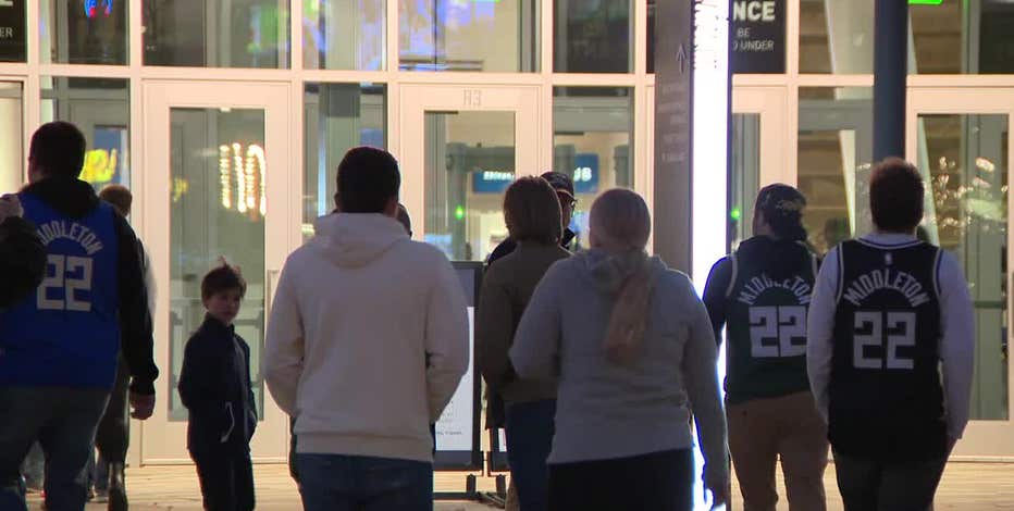 Bucks fans welcome back Khris Middleton in season opener at Fiserv Forum