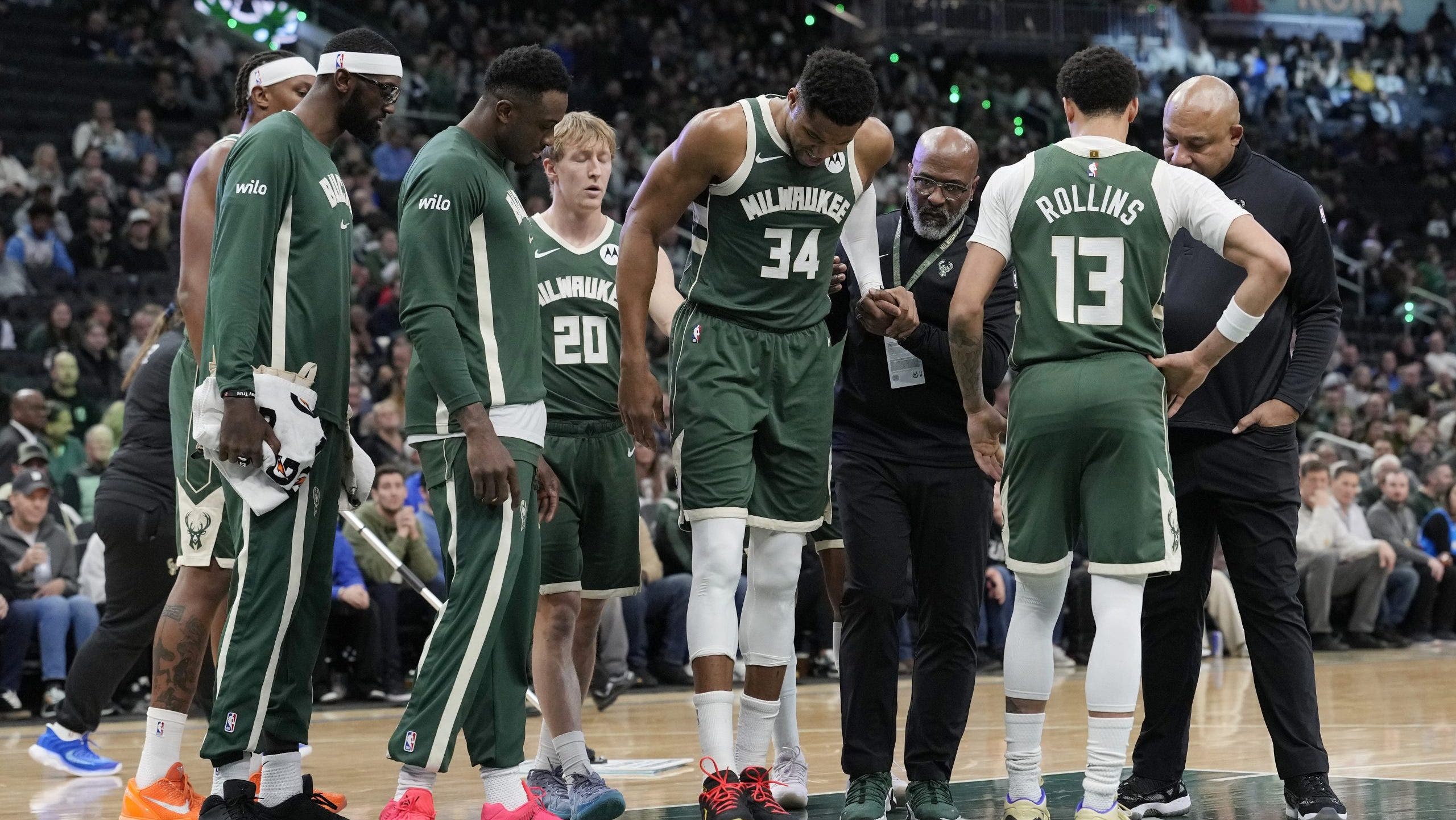 Bucks rally past Pistons after Giannis exits early with calf injury