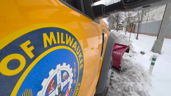 Wisconsin winter storm; cleanup phase includes snow, leaves